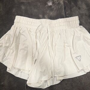 ATHLETIC WHITE FLOWY SKIRT/SHORTS - SIZE: SMALL